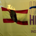 Bandera quemada sobre el escenario de la ANC y Òmnium durante la Diada. Foto: retransmisión ANC
